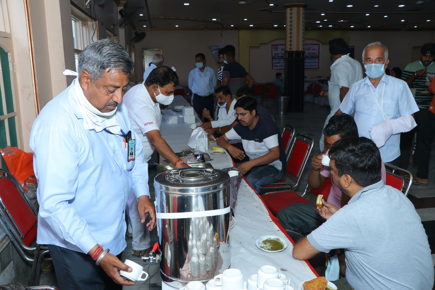Youth and senior community members participating in life-saving drive