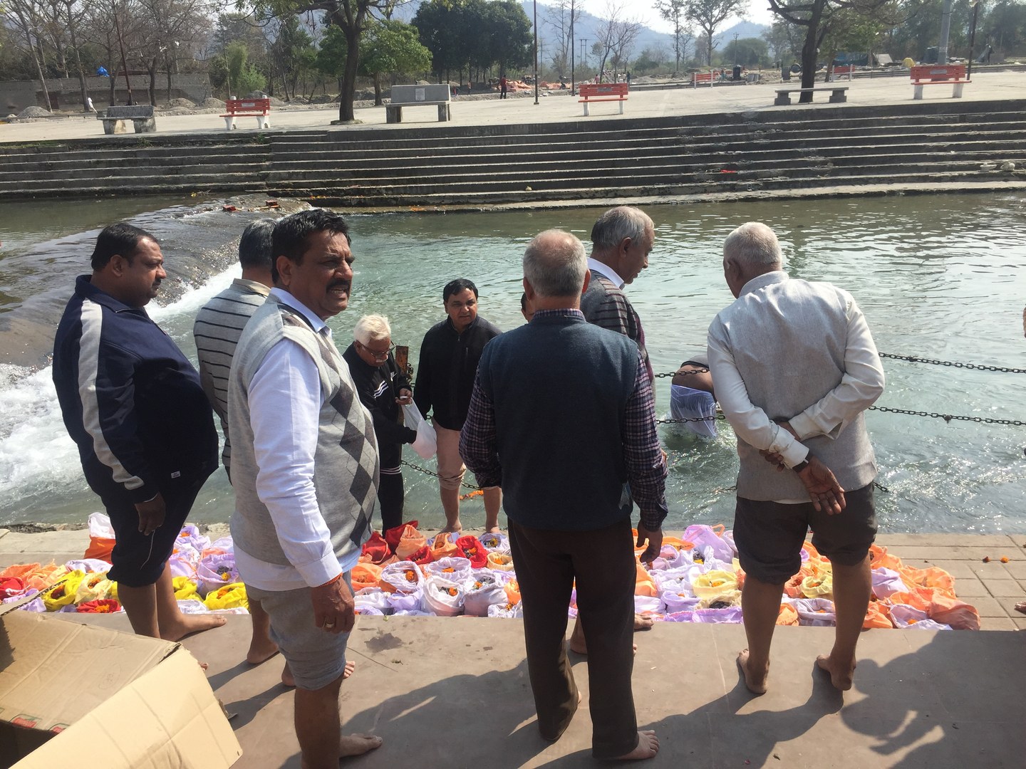 Executive committee members and volunteers performing sacred duty without discrimination