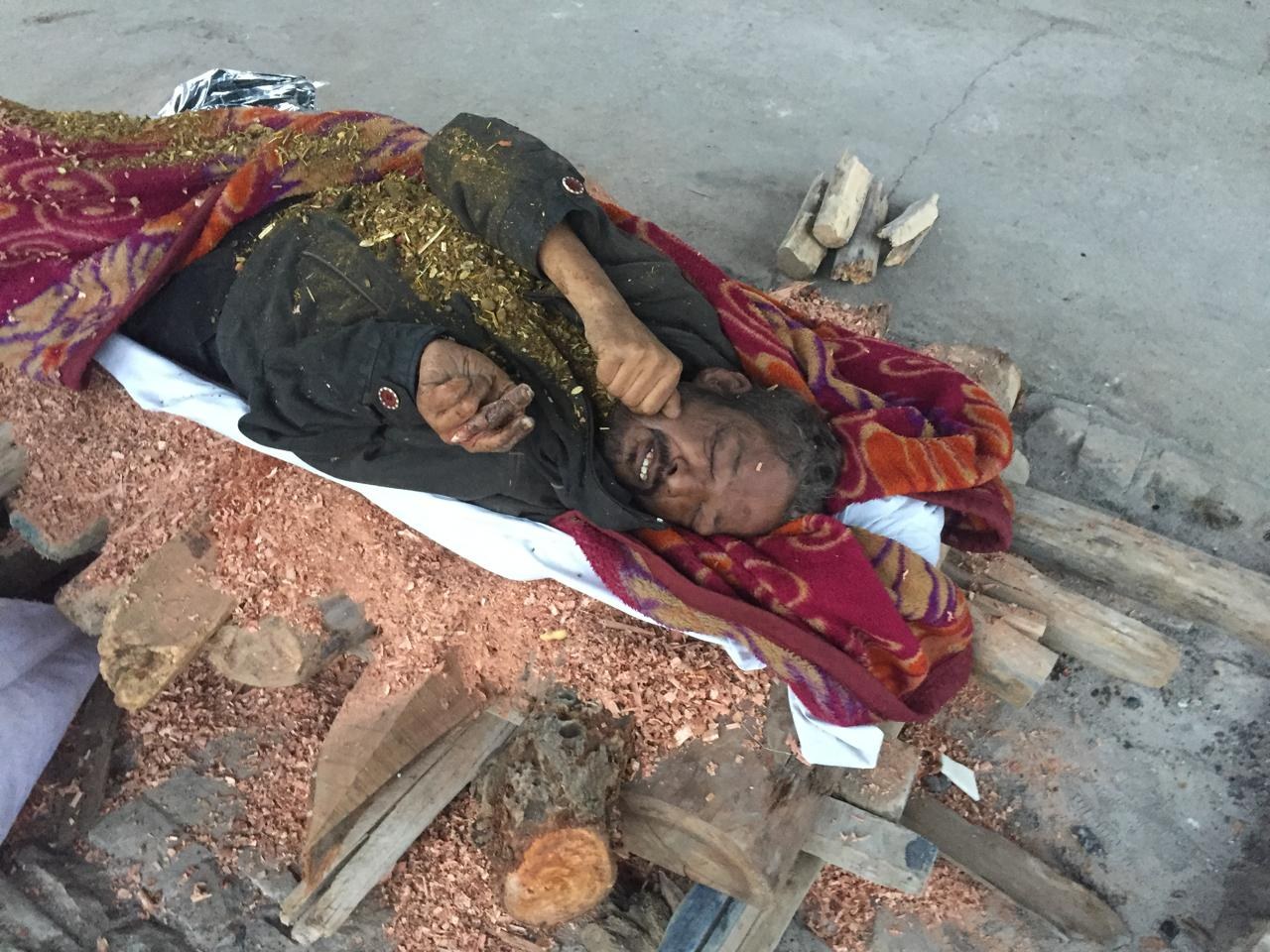 Society team immersing sacred mortal remains in holy River Ganga at Har Ki Pauri