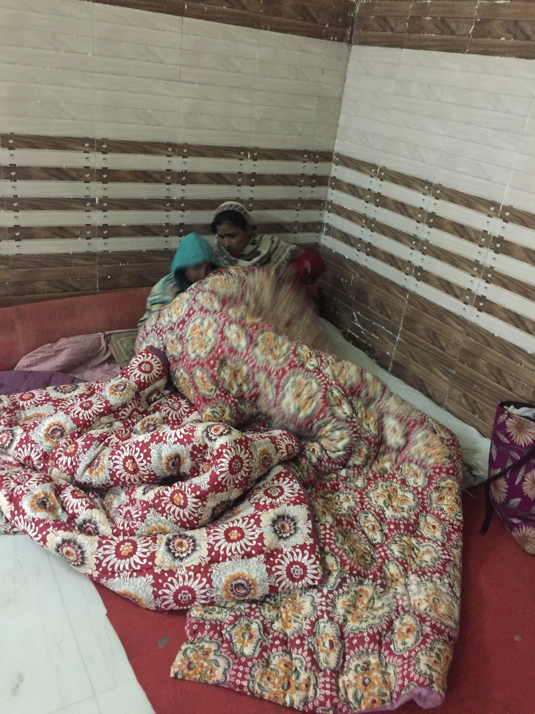 Spacious room accommodating multiple stranded citizens during transit